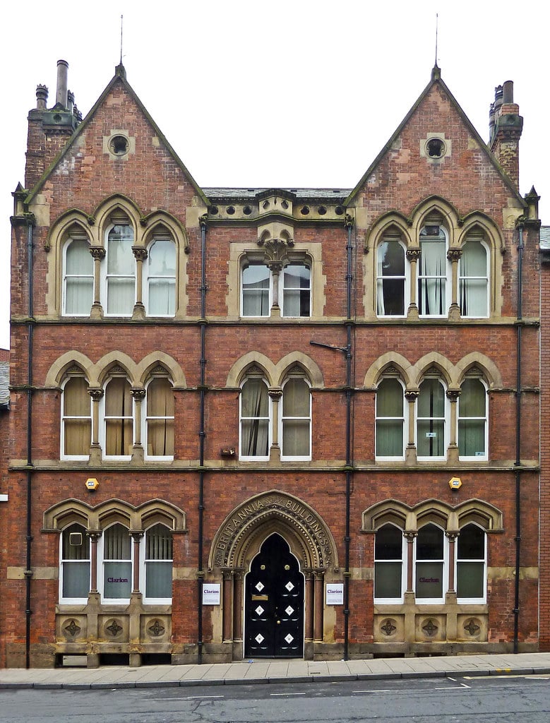 Commercial residential building exterior requiring professional window cleaning